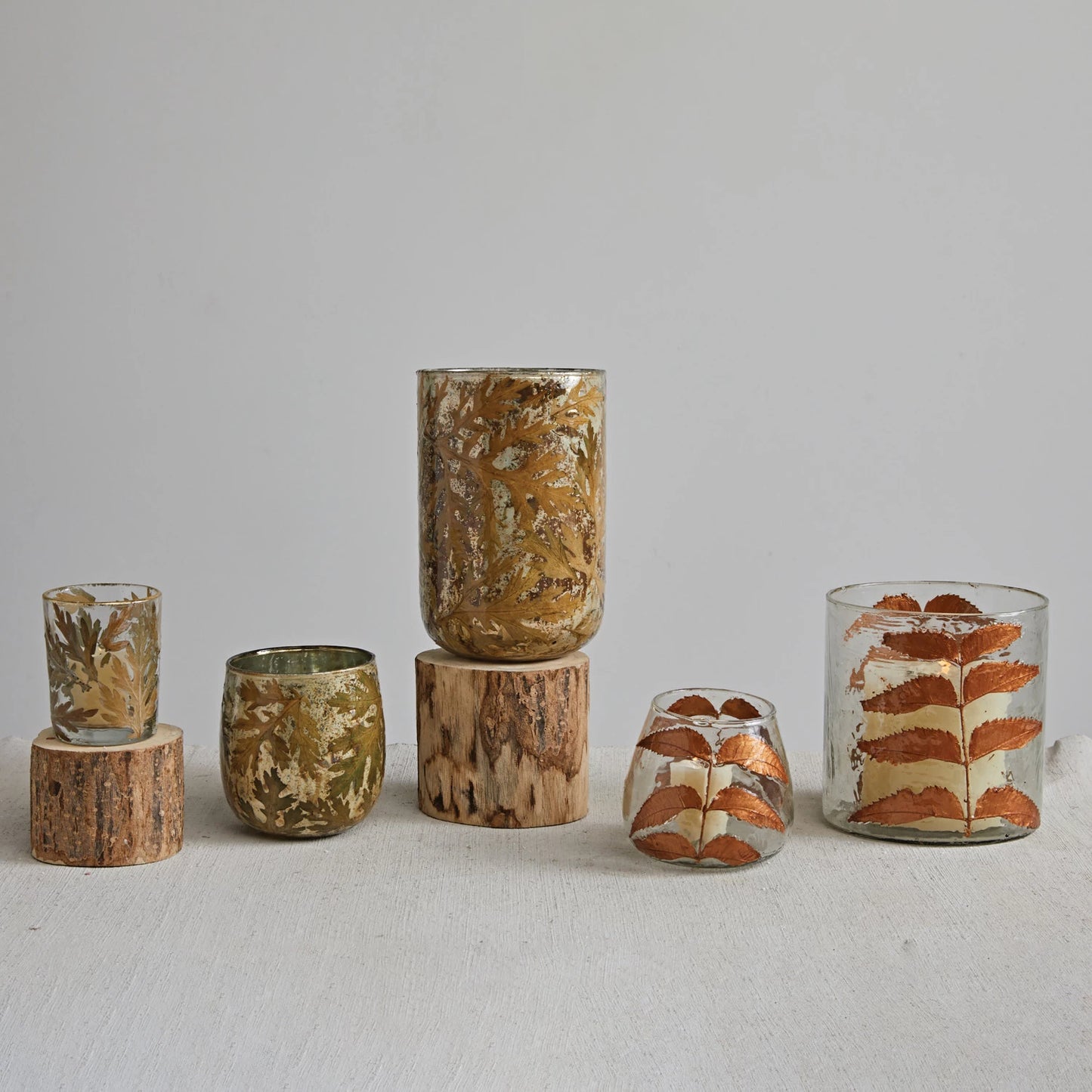 MERCURY GLASS VOTIVE HOLDER WITH EMBEDDED NATURAL OAK LEAVES